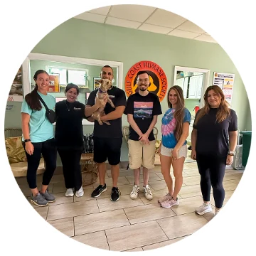 Eightpoint team members volunteering at the Gulf Coast Humane Society